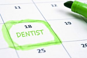 Incorporating on-hold music and messaging is more than just a courtesy; it’s a strategic tool that can significantly enhance patient experience and satisfaction - calendar with date circled and word dentist written in to convey making a dental appointment