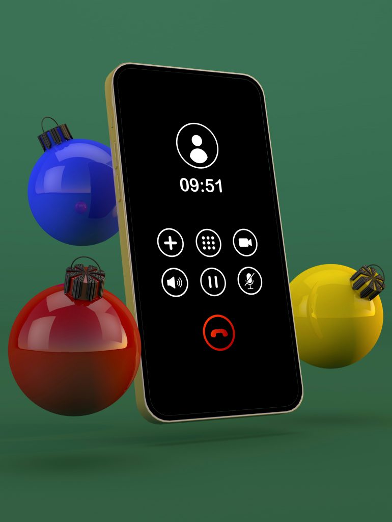 On-Hold Messaging: Maximizing Every Call - Phone with call screen displayed hovering in front of a green background with three christmas ornaments